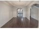 Formal dining room with hardwood floors and wainscoting at 5315 Hopewell Manor Dr, Cumming, GA 30028