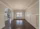 Formal dining room with hardwood floors and wainscoting at 5315 Hopewell Manor Dr, Cumming, GA 30028