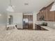 Modern kitchen with granite countertops and stainless steel appliances at 5315 Hopewell Manor Dr, Cumming, GA 30028