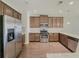 Modern kitchen with stainless steel appliances and granite countertops at 5315 Hopewell Manor Dr, Cumming, GA 30028