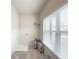 Laundry room with large window and built-in shelving at 5315 Hopewell Manor Dr, Cumming, GA 30028