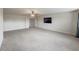 Large main bedroom with wall-to-wall carpet and multiple windows at 5315 Hopewell Manor Dr, Cumming, GA 30028