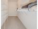 Spacious walk-in closet with wire shelving and hanging rods at 5315 Hopewell Manor Dr, Cumming, GA 30028