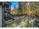 Private backyard with wooded area and steps to patio at 1054 Sunny Field Ln, Lawrenceville, GA 30043