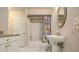 Full bathroom with shower/tub combo and updated vanity at 1054 Sunny Field Ln, Lawrenceville, GA 30043