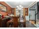 Formal dining room with hardwood floors and chandelier at 1054 Sunny Field Ln, Lawrenceville, GA 30043