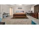 Large main bedroom with carpeted floors and a ceiling fan at 1054 Sunny Field Ln, Lawrenceville, GA 30043