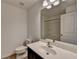 Bathroom with single vanity, toilet and shower at 1124 Lossie Ln, Grayson, GA 30017