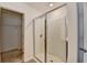 Bathroom with shower and access to closet at 1124 Lossie Ln, Grayson, GA 30017