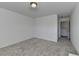 Spacious bedroom with carpet and access to a hallway at 1124 Lossie Ln, Grayson, GA 30017