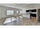 Modern kitchen with dark cabinetry, granite countertops, and stainless steel appliances at 1124 Lossie Ln, Grayson, GA 30017