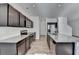 Modern kitchen with granite countertops and stainless steel appliances at 1124 Lossie Ln, Grayson, GA 30017