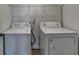 Laundry room with washer and dryer at 1124 Lossie Ln, Grayson, GA 30017