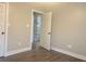 Bright bedroom with hardwood floors and access to other rooms at 85 Hammock Dr, Covington, GA 30016