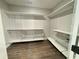 Large walk-in closet with ample shelving and storage at 85 Hammock Dr, Covington, GA 30016