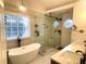 Luxurious bathroom with soaking tub and walk-in shower at 1563 Bailey Farms Dr, Lawrenceville, GA 30043