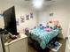Charming bedroom with decorative bed and hardwood floors at 1563 Bailey Farms Dr, Lawrenceville, GA 30043