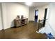 Spacious upstairs hall with hardwood floors and built-in storage at 1563 Bailey Farms Dr, Lawrenceville, GA 30043