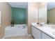 Relaxing bathroom with a garden tub and double vanity at 4701 Highpoint Ln, Atlanta, GA 30349