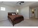 Main bedroom with a ceiling fan and en-suite bathroom at 4701 Highpoint Ln, Atlanta, GA 30349