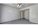 Bright bedroom with grey flooring and ceiling fan at 631 Church Nw St, Atlanta, GA 30318