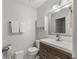 Clean bathroom with wood vanity and updated fixtures at 2479 Cedar Canyon Se Rd, Marietta, GA 30067