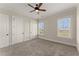 Bright bedroom with two windows offering natural light and a ceiling fan at 351 Washington Ne Ave # 302, Marietta, GA 30060
