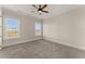 Spacious bedroom with two large windows and ceiling fan at 351 Washington Ne Ave # 302, Marietta, GA 30060