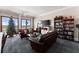 Comfortable common area with seating, a TV, and a well-stocked library at 351 Washington Ne Ave # 302, Marietta, GA 30060