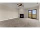 Large living room with fireplace and doors leading to a balcony at 351 Washington Ne Ave # 302, Marietta, GA 30060