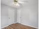 Bedroom with two closets and wood-look floors at 3709 Tate Pl, Austell, GA 30106