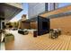 Outdoor patio with TV, seating, and city views at 40 12Th Ne St # 1202, Atlanta, GA 30309