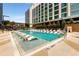 Inviting pool area with plenty of lounge chairs for relaxation at 40 12Th Ne St # 1202, Atlanta, GA 30309