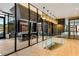 Modern glass stairs leading to a community kitchen at 40 12Th Ne St # 1202, Atlanta, GA 30309