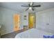 Spacious bedroom with access to bathroom and hallway at 5997 Wild Creek Rd, Sugar Hill, GA 30518