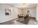 Dining room with a wood table and six black chairs at 8309 Dunellen Ln, Jonesboro, GA 30238