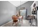 Dining area with wood table and chairs, gray walls, and carpeted floor at 117 Javay Ct, Villa Rica, GA 30180