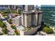 High-rise building with rooftop pool and city views at 565 Peachtree Ne St # 1209, Atlanta, GA 30308