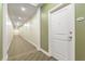 Residential hallway with neutral color palette at 565 Peachtree Ne St # 1209, Atlanta, GA 30308