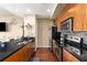 Modern kitchen with stainless steel appliances and granite countertops at 565 Peachtree Ne St # 1209, Atlanta, GA 30308