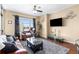 Spacious living room with hardwood floors and city views at 565 Peachtree Ne St # 1209, Atlanta, GA 30308