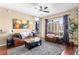 Spacious living room with hardwood floors and city views at 565 Peachtree Ne St # 1209, Atlanta, GA 30308