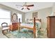 Charming bedroom with antique furniture and ceiling fan at 116 Centennial Dr, Peachtree City, GA 30269