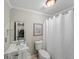 Clean bathroom with a shower/tub combo and vanity at 1189 Liberty Nw Pkwy, Atlanta, GA 30318