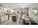 Modern kitchen with white cabinets, granite countertops, and island at 1189 Liberty Nw Pkwy, Atlanta, GA 30318