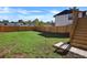 Large backyard with wooden fence and city view at 541 Sunset Nw Ave, Atlanta, GA 30318