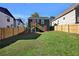 Charming home with a large backyard and wooden fence at 541 Sunset Nw Ave, Atlanta, GA 30318