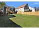 Spacious backyard with a wooden fence at 541 Sunset Nw Ave, Atlanta, GA 30318