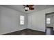 Well-lit bedroom with dark hardwood floors and a ceiling fan at 541 Sunset Nw Ave, Atlanta, GA 30318