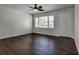 Bright living room featuring hardwood floors and a ceiling fan at 541 Sunset Nw Ave, Atlanta, GA 30318